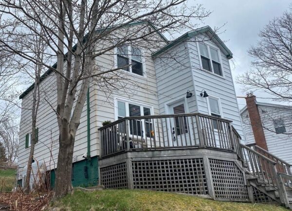 Exterior siding project before and after in Barrie