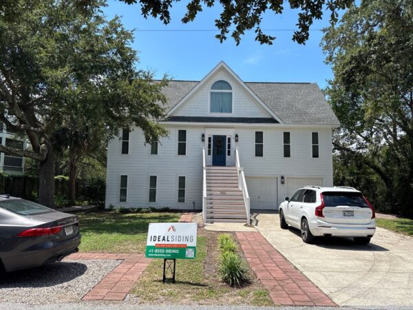 Vinyl replaced with Arctic White JH planks, straight edge shakes