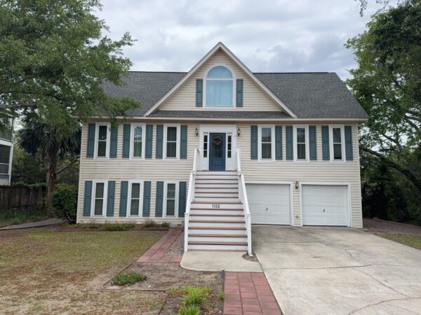 Vinyl replaced with Arctic White JH planks, straight edge shakes