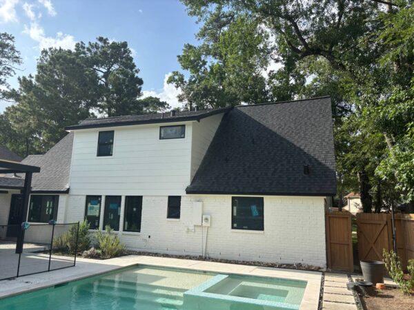 Installation of 12” James Hardie siding