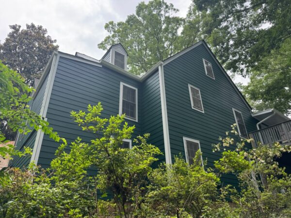 VINYL SIDING REPLACED WITH JAMES HARDIE PRIMED 8.25