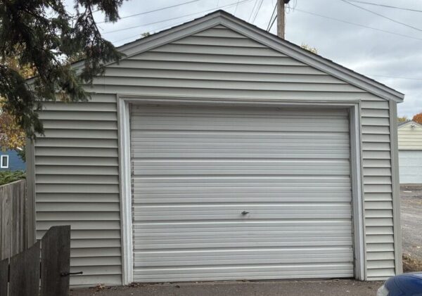Installed new vinyl D4 (4 inch reveal) horizontal plank siding by Mastic, Carvedwood line in Sage color