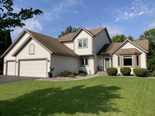 Removed wood trim boards - installed new James Hardie trim boards in Khaki Brown color.