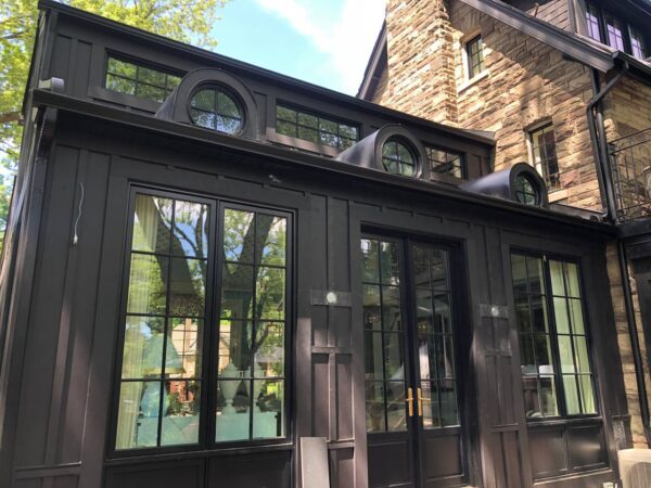 Complete construction excepted the stone areas James Hardie Smooth Panels B&B every 18” on Midnight Black