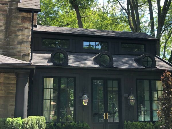 Complete construction excepted the stone areas James Hardie Smooth Panels B&B every 18” on Midnight Black