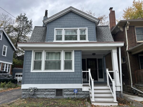 Siding replacement from 100 Year-old Cedar Shingle Shake to James Hardie Fiber cement