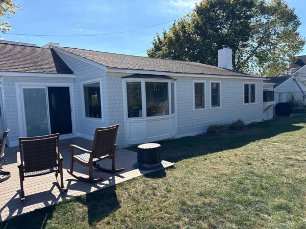 Residential home siding improvement project in Arctic White