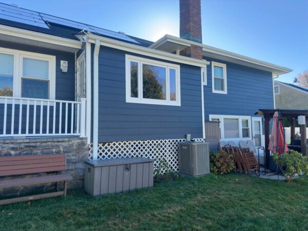 JH plank in deep ocean with Azek trims soffit and fascia.