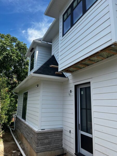 Full house renovation with James Hardie Cedarmill planks and JH B&B 16” spacing Smooth Panels